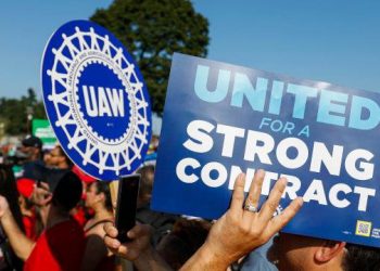 The UAW Strike Against the Big Three Automakers cover