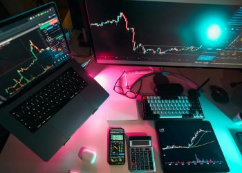 A laptop computer sitting on top of a desk