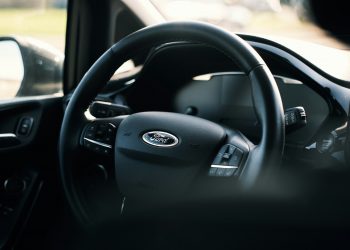 black nissan car steering wheel