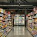 grocery store aisle with stocked shelves