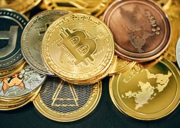 a pile of gold and silver bitcoins